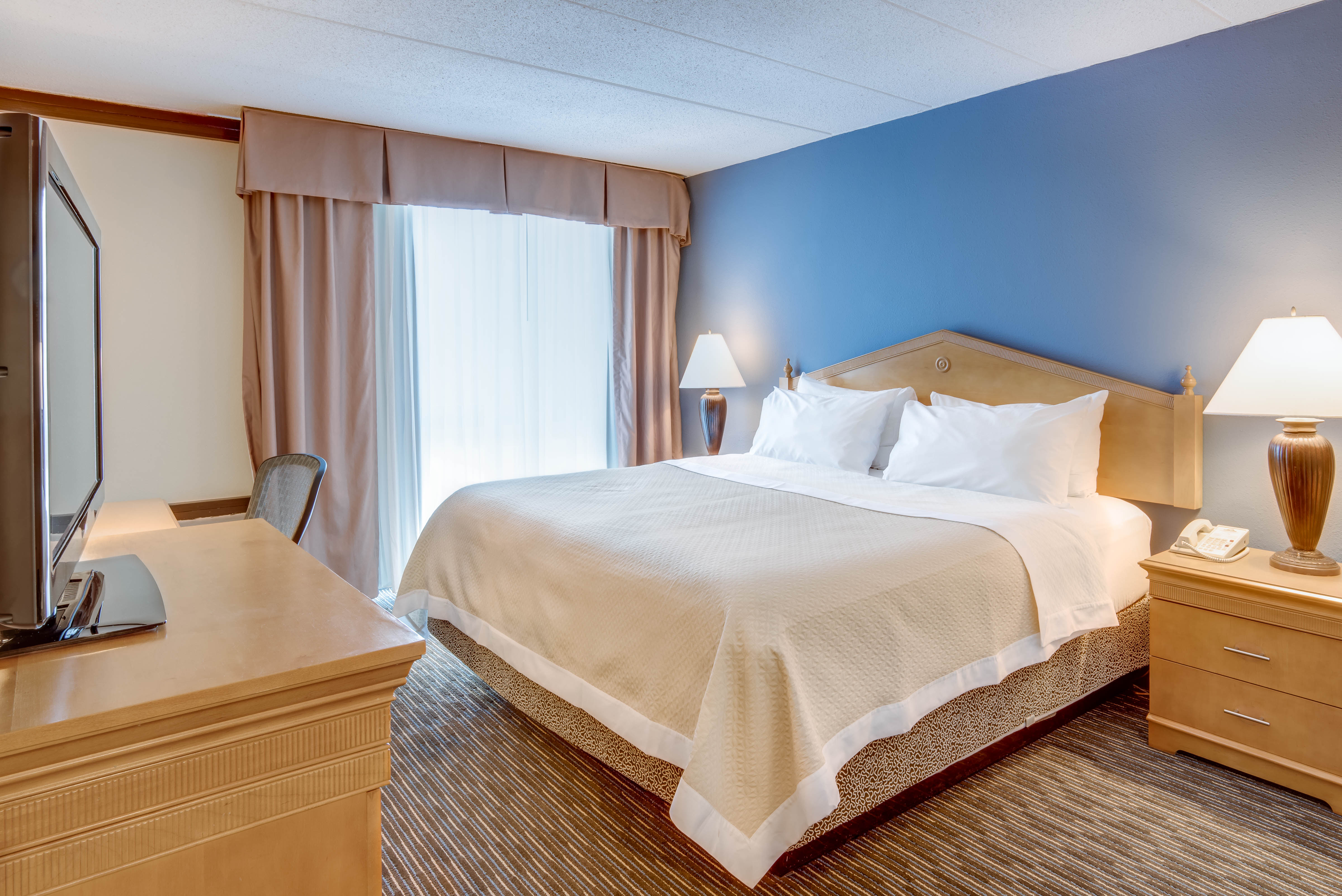 Guest room at the Days Hotel by Wyndham Toms River Jersey Shore in Toms River, New Jersey